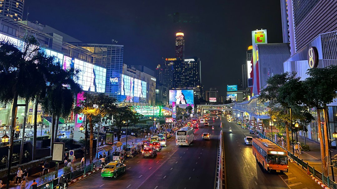 Neon-lit Bangkok street at night