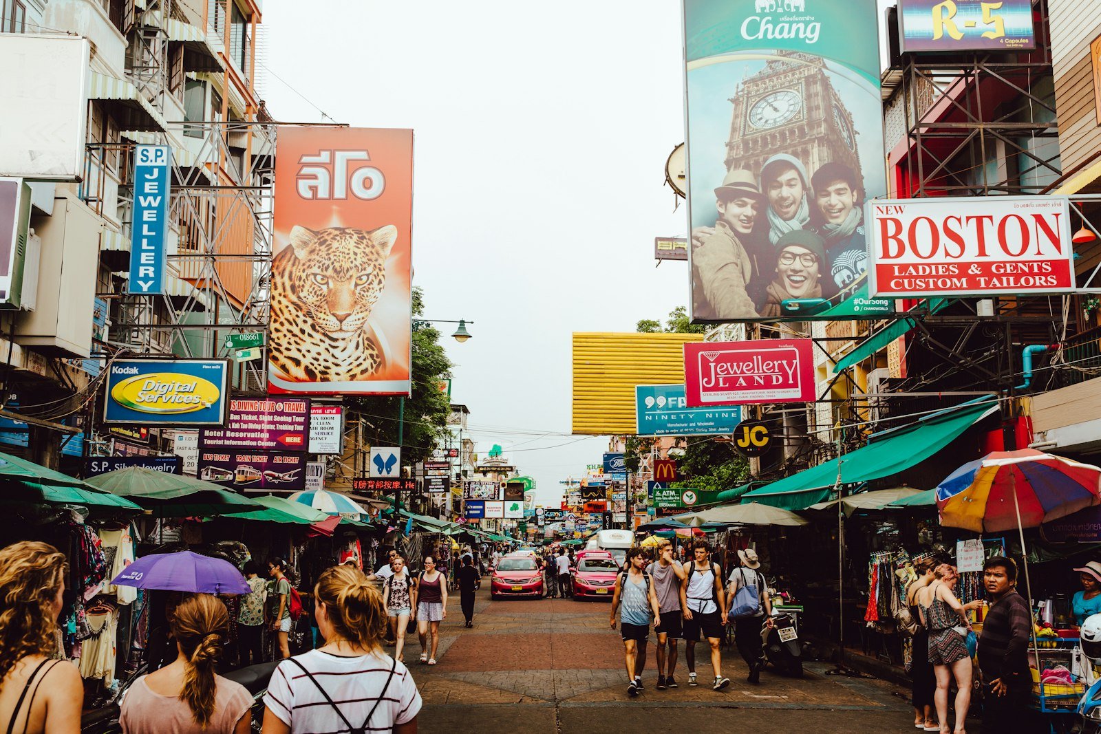 Travelers walking through Khao San Road in Bangkok