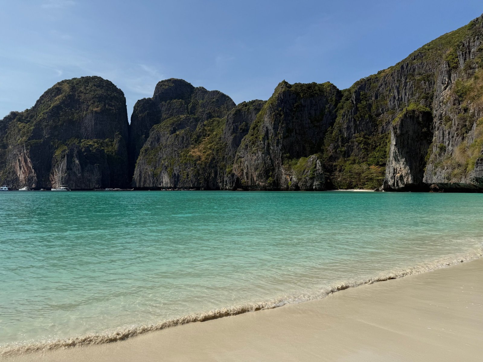 Maya Bay in the Phi Phi Islands with turquoise water and limestone cliffs